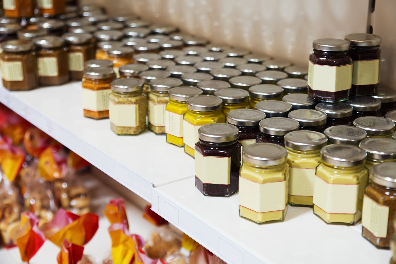Assorted honey jars on store shelf