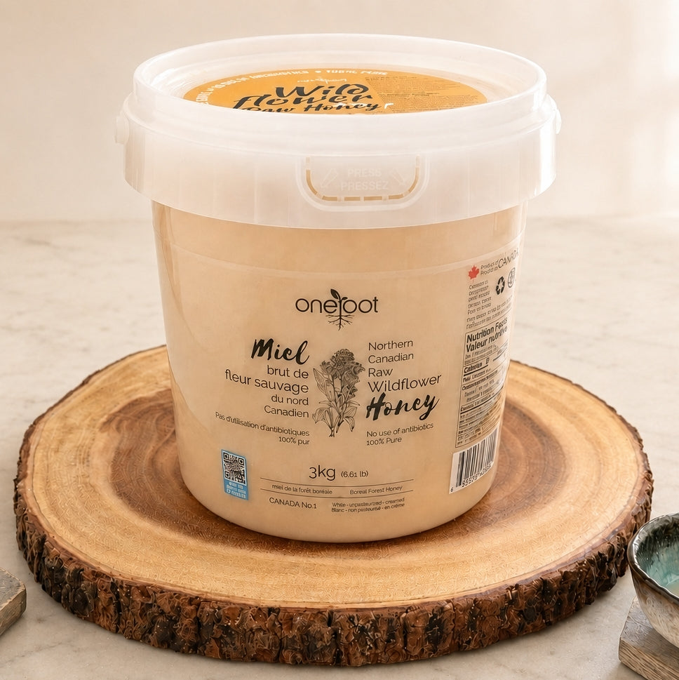 Honey pail on round wooden board